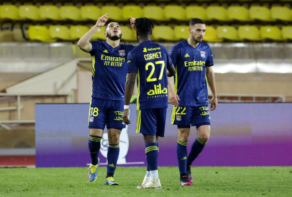 Ten-man Olympique Lyonnais revived their Champions League hopes