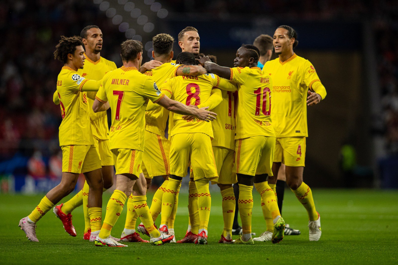 Salah scores 2 as Liverpool tops 10-man Atlético