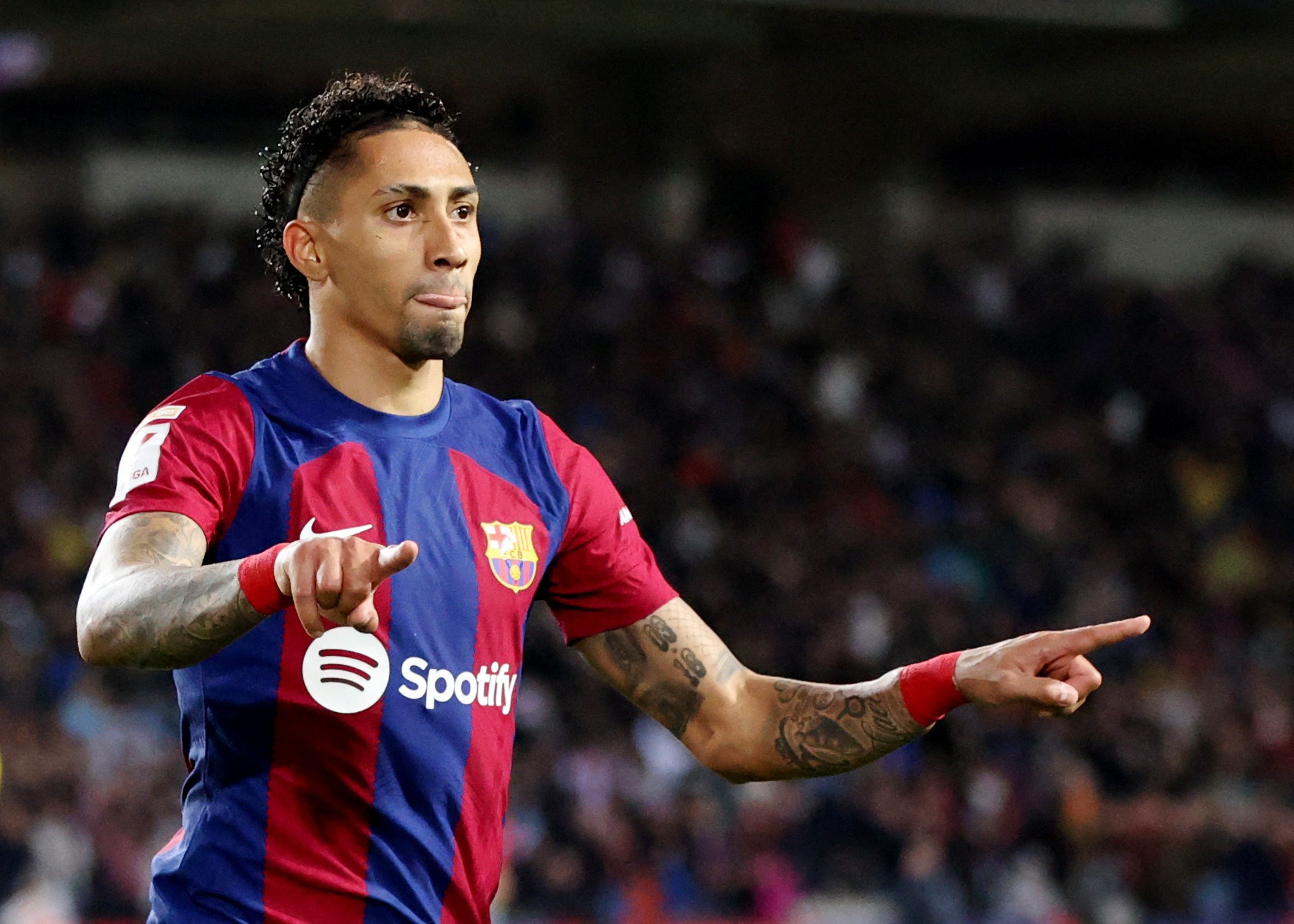 Barcelona's Financial Woes May Lead to Raphinha Sale, with Arsenal and Chelsea Eyeing Opportunity