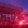 Nine arrested as Liverpool fans defy police warnings to gather at Anfield | English Premier League